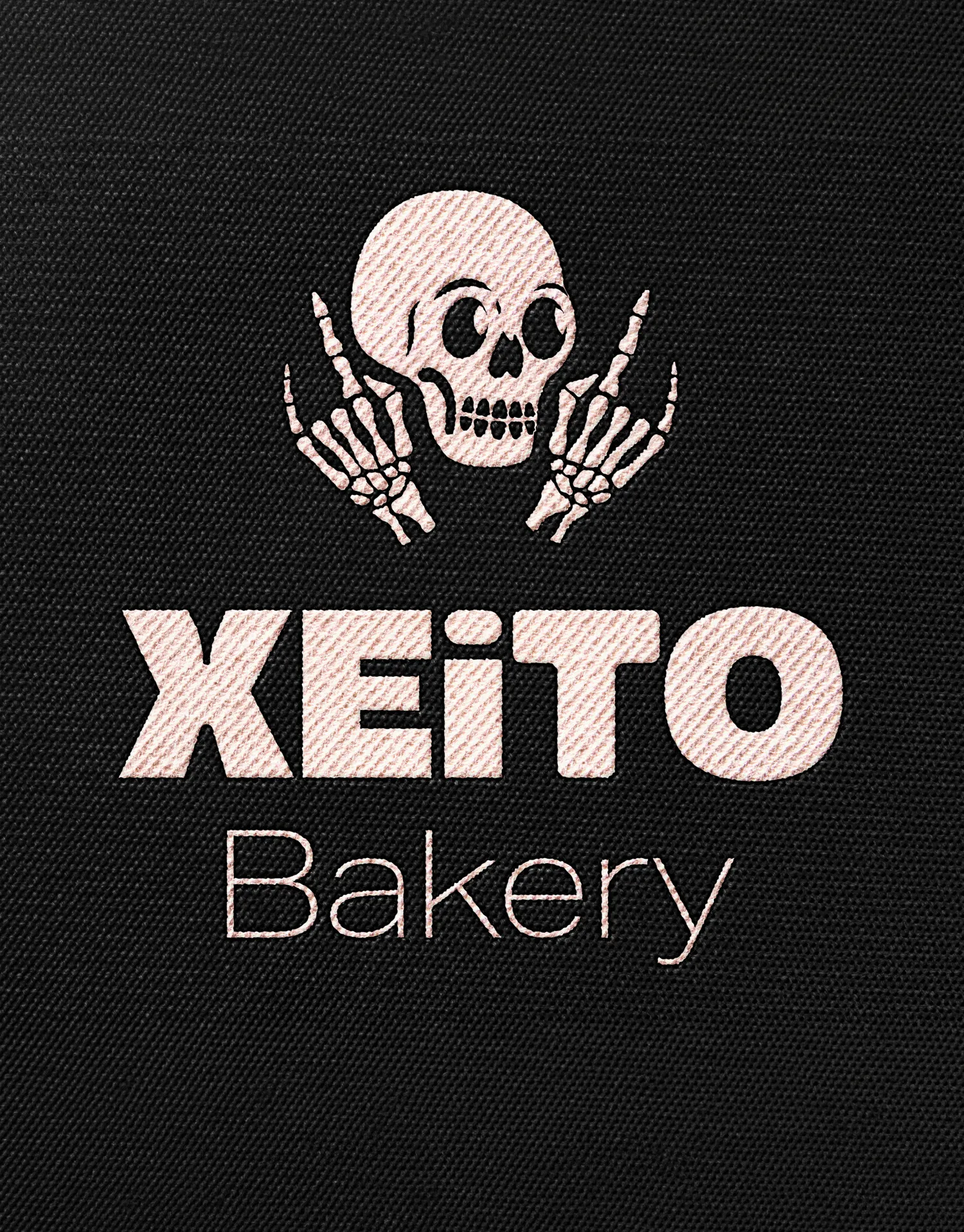 Detalle textil con el logotipo de Xeito Bakery